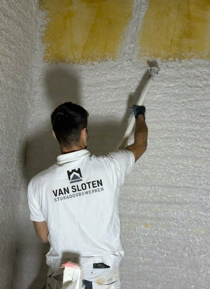 Van sloten stukadoorswerken vakmannen aan het werk